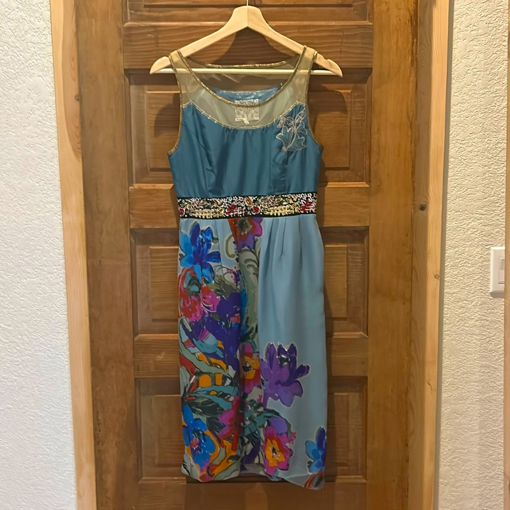 Beautiful gold and teal Floreat Anthropologie dress with a floral pattern